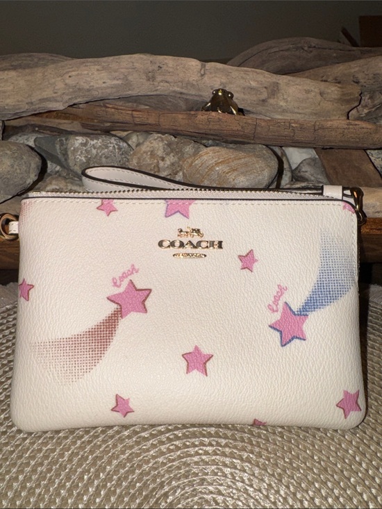 Coach Handbags - Coach Cream Wristlet with Pink Star Print and Blue Accents